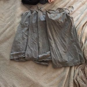 Four grey Camis